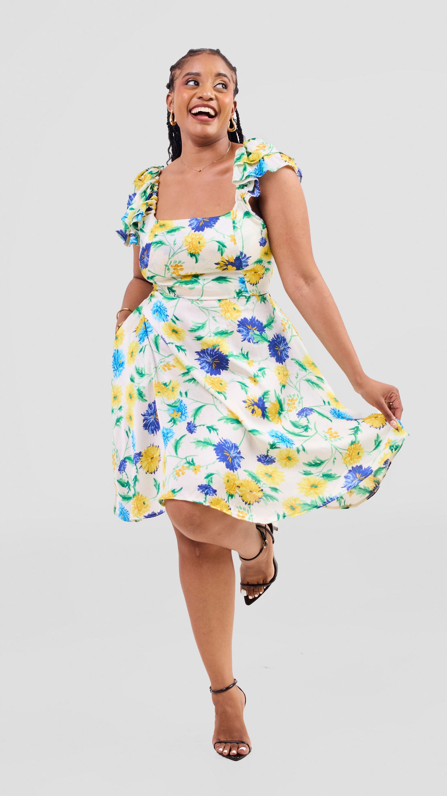 Enzi cream and blue flowery knee length dress